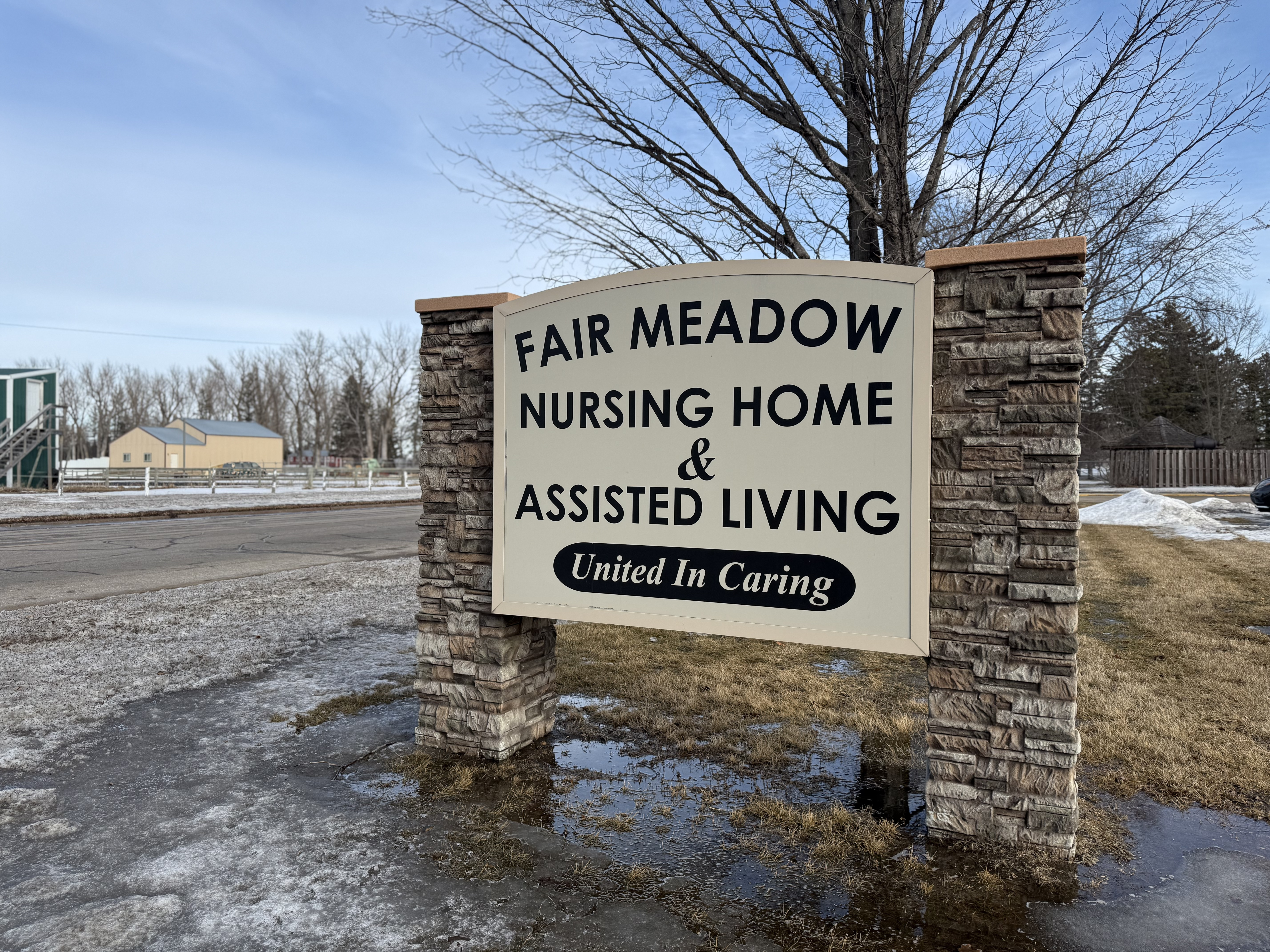 Photo of the Fair Meadow Nursing Home and Assisted Living sign in front of the building