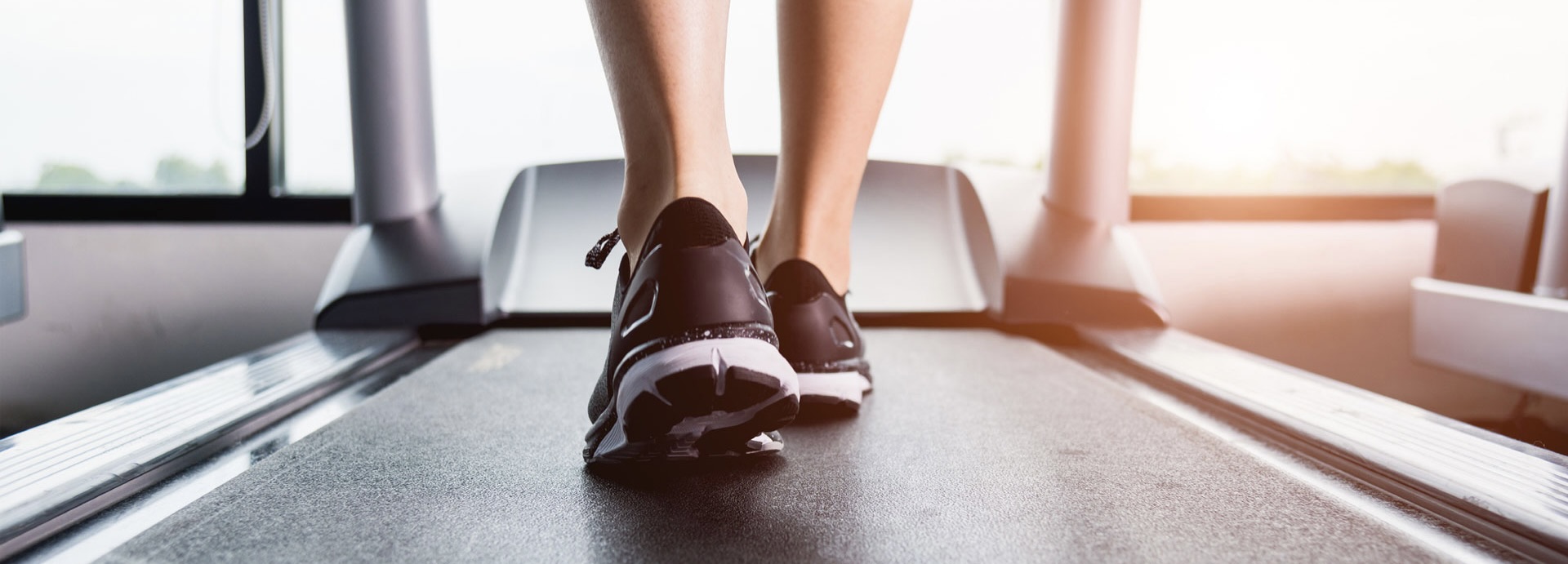 someone walking on treadmill to show exercise