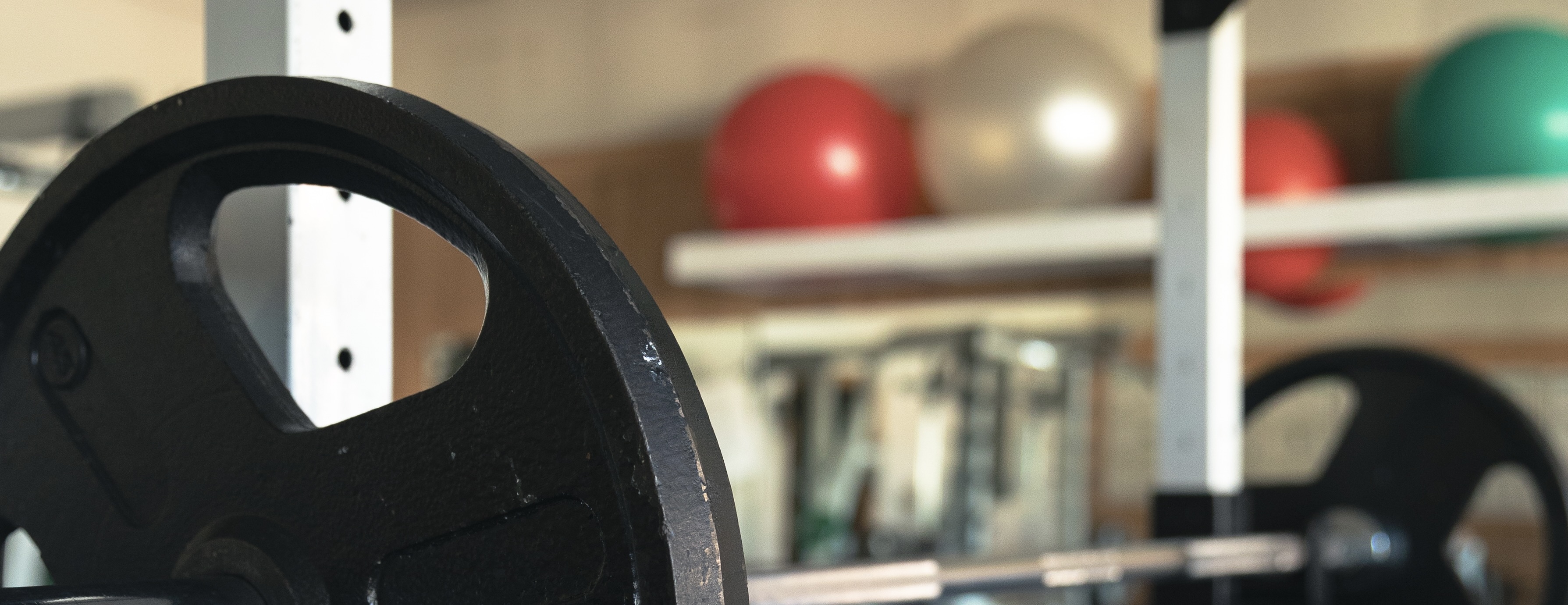 image of entry at Poissants with workout equipment