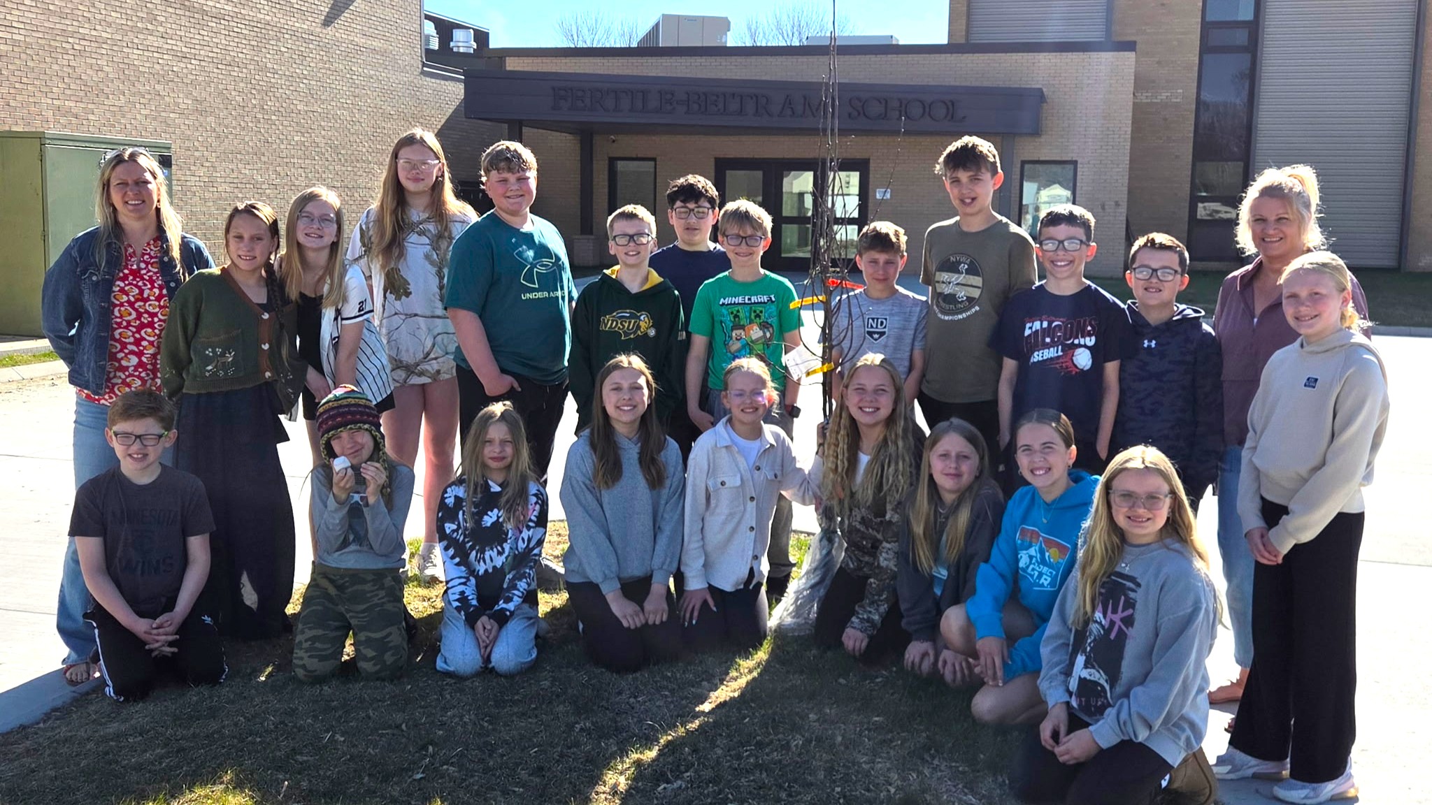 5th grade plants trees donated by Polk Cty Public Health!